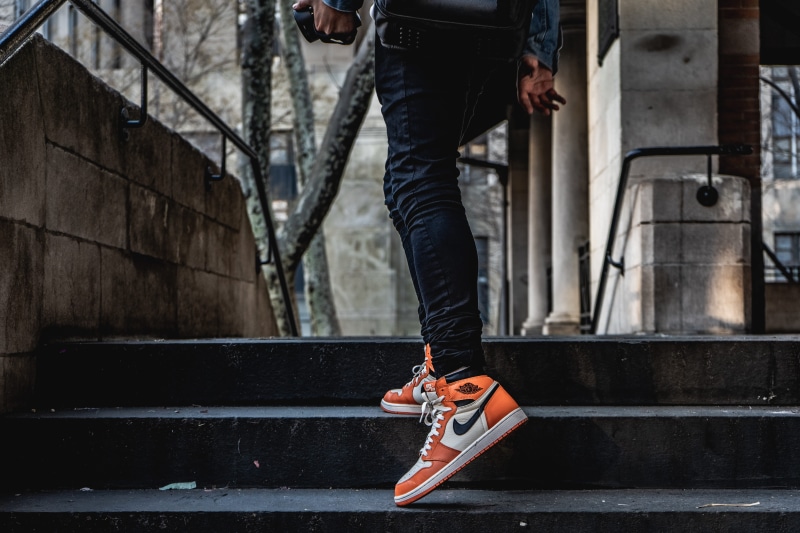 fashion, human arm, outdoors, wear, body part, air, human body part, human limb, one person, man, day, style, shoe, human leg, 5K, urban, ramp, nike, clothing