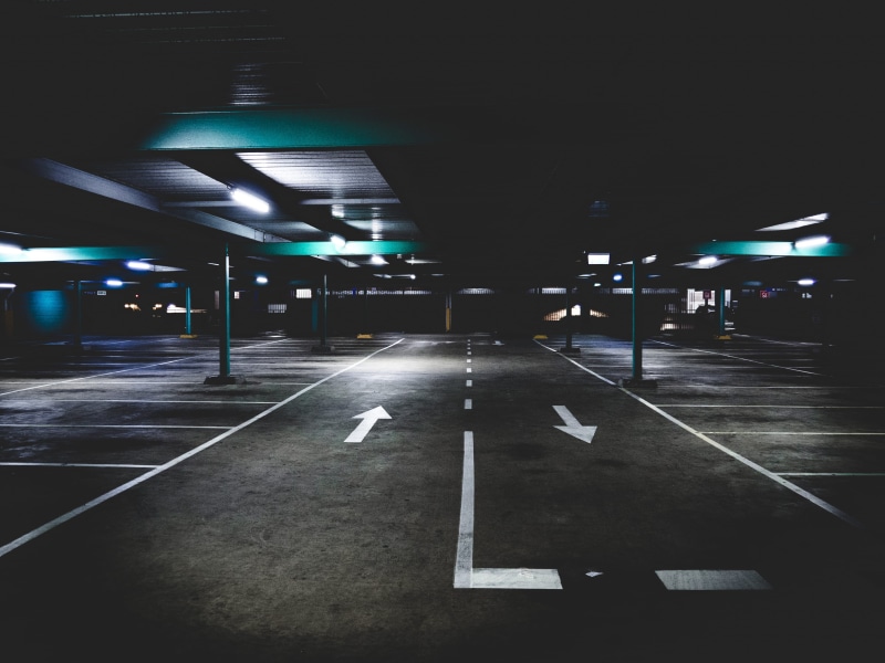 empty, nighttime, transportation, roof, ghosttown, road marking, no people, city, road, car park, sign, illuminated, lighting equipment, parking, white line
