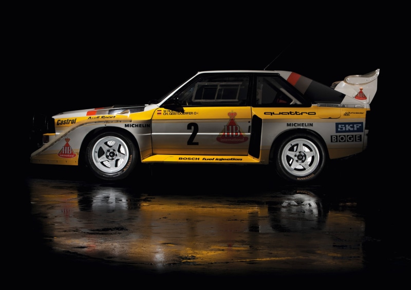 wheel, Audi Sport Quattro S1, safety, land vehicle, reflection, wet, Rally, night, tire, transportation, text, motor vehicle, Audi, no people, outdoors