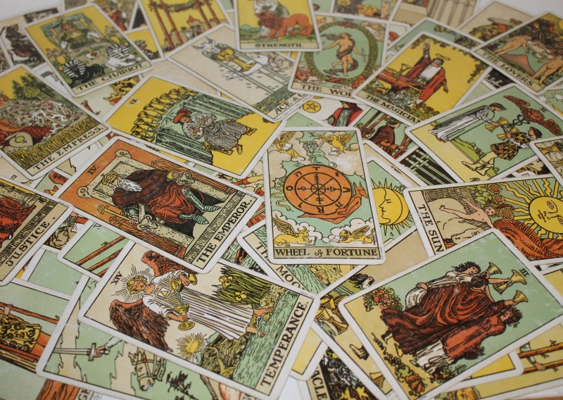divination, no people, guidance, paper, postage stamp, still life, indoors, large group of objects, full frame, choice, esoteric, card, mail, communication