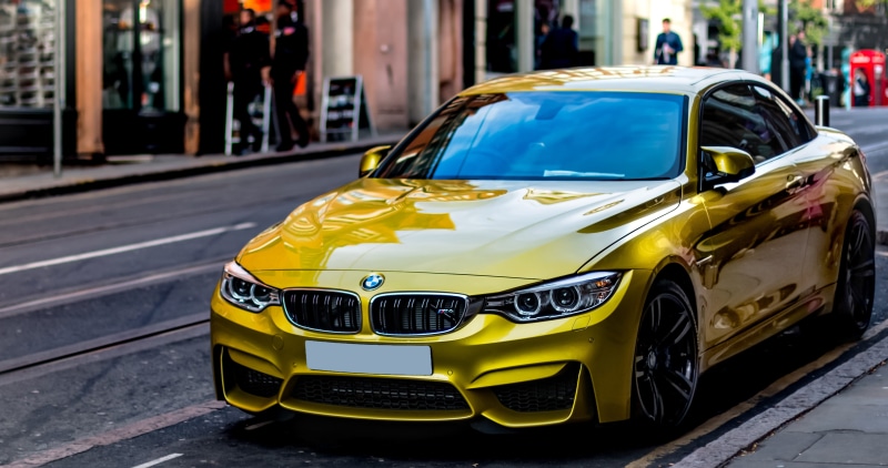 land vehicle, focus on foreground, 4K, drive, motor vehicle, car, bmw, day, road, bmw m4, convertible, street, performance, building exterior, city, luxury
