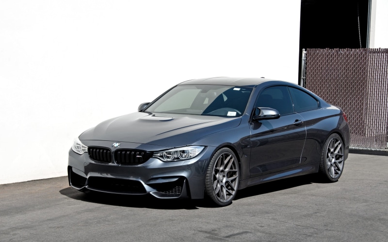 garage, car, BMW M4, black, no people, cuoupe, copy space, transportation, stationary, parking, retro styled, silver colored, outdoors, luxury, land vehicle