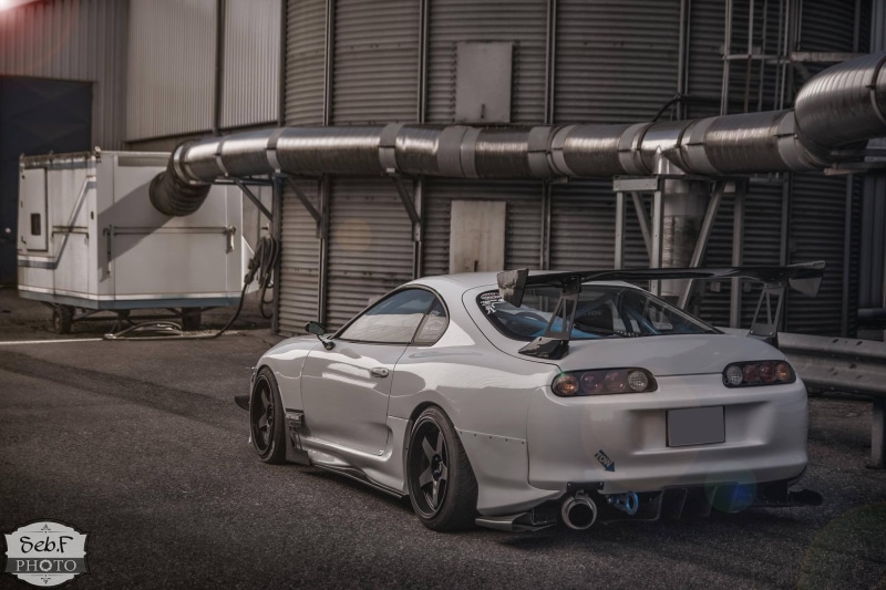 parking, car, transportation, silver colored, 1080P, coupe, land vehicle, city, pipe - tube, architecture, built structure, outdoors, day, toyota, stationary