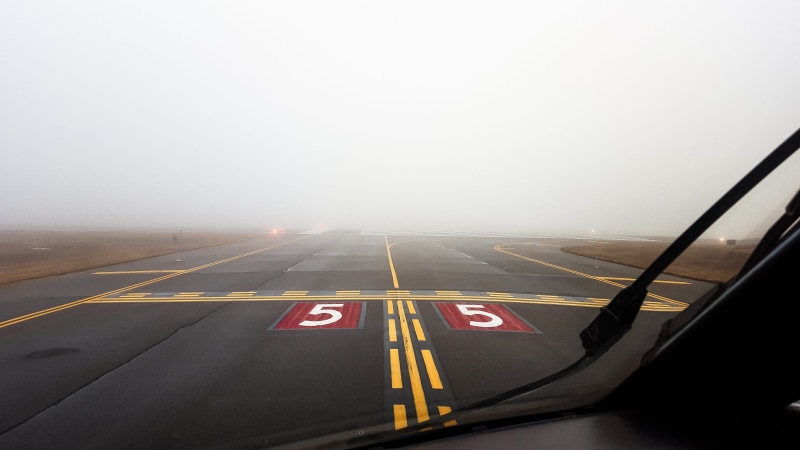 flight, marking, no people, plane, Runway, Aircraft, car, airline, airfield, Fog, jet, number, the way forward, direction, text, Airport, aviation, outdoors