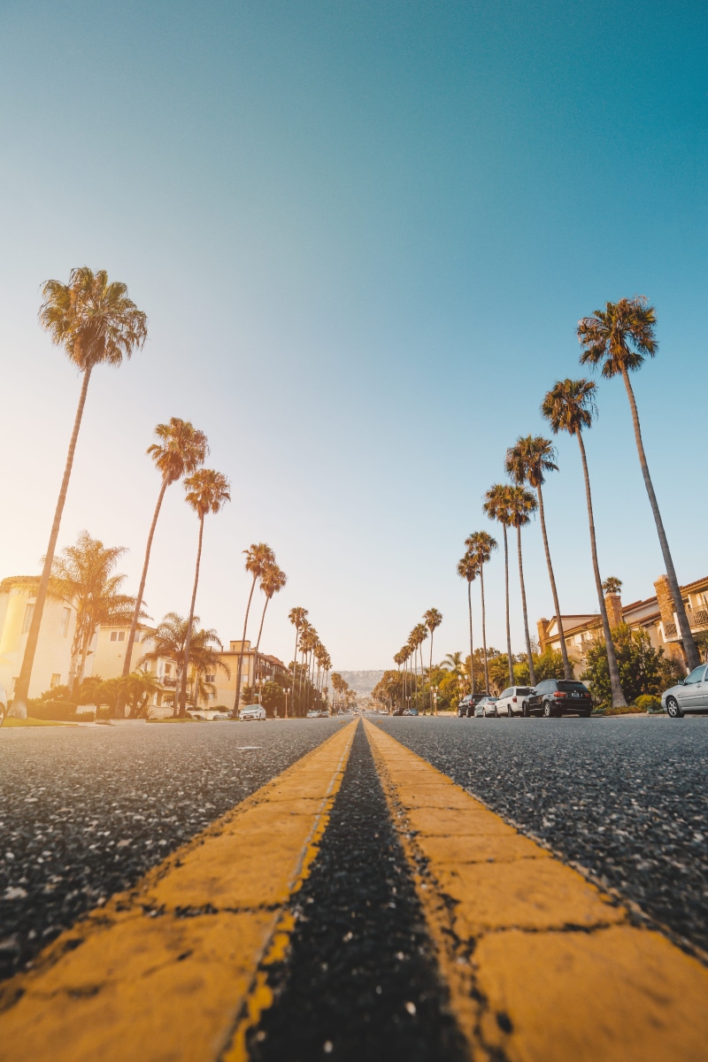 sunrise, vacations, tourism, city, concrete, urban Scene, 5K, clear sky, marking, palmtree, sun, perspective, famous Place, blue sky, water, yellow, roadside
