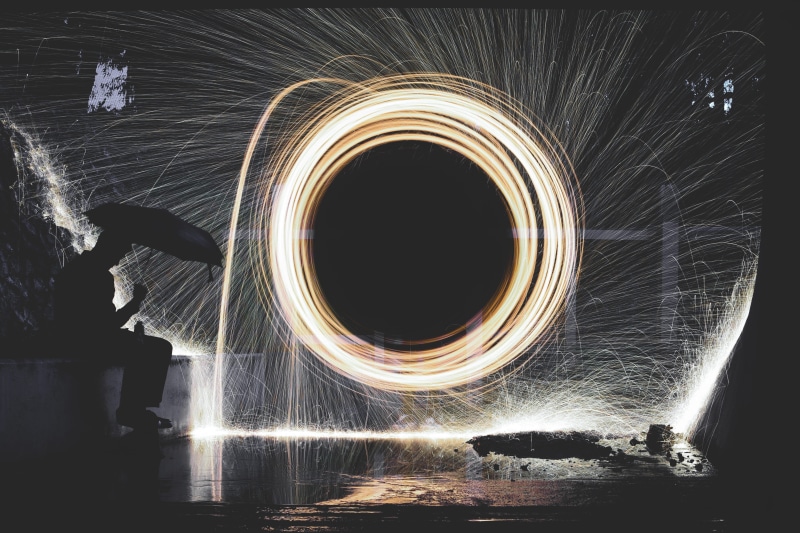 photography, rain, fun, nighttime, swirl, spark, digital composite, long exposure, night, person, lightning, firework, water, light, tunnel, holding, fire