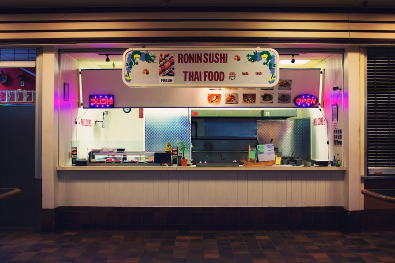 text, interior design, sign, non-western script, storefront, no people, architecture, communication, indoors, store, restaurant, sushi, night, purple, flooring