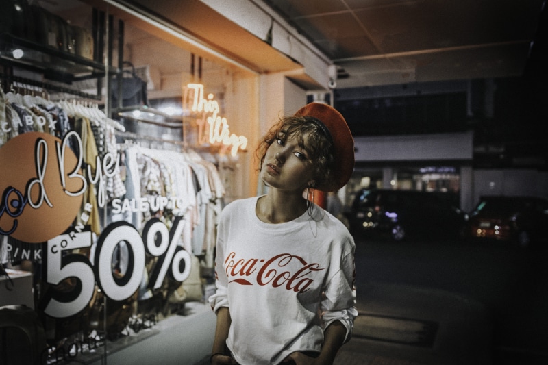 text, contemplation, 5K, indoors, front view, cola, lifestyles, sweater, architecture, coca, communication, standing, white, hip, vintage, neck, shirt