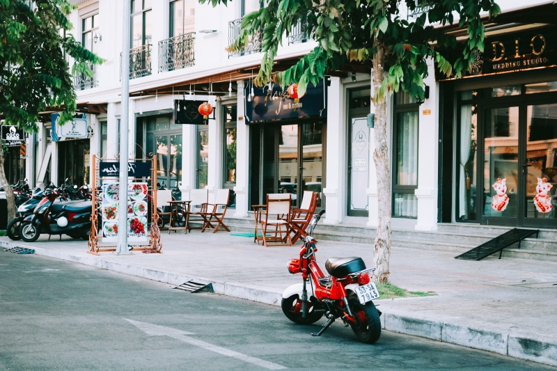 car, city, motorcycle, building, parked, vietnam, road, building exterior, residential district, incidental people, motor scooter, outside, men, land vehicle