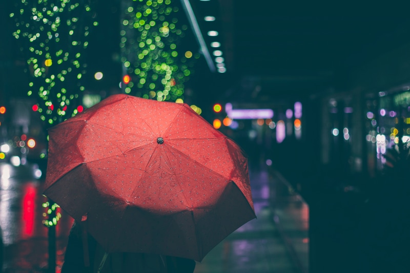 focus on foreground, close-up, water, security, city, using, outdoors, urban, monsoon, illuminated, rain, architecture, street, umbrella, lighting equipment