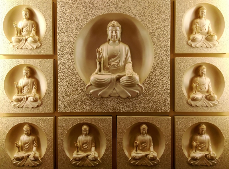 door, floral pattern, statue, representation, buddha, architecture, circular, wall - building feature, bas relief, male likeness, human representation