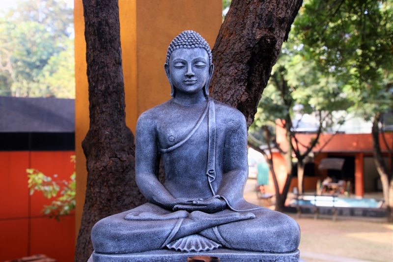 male likeness, no people, concrete, idol, tree, sitting, representation, handicraft, statue, place of worship, meditation, spiritual, symbol, sculpture