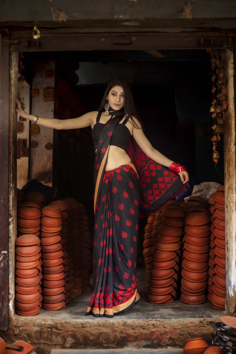 large group of objects, woman, red, stack, apparel, wearing, brown, dance pose, fashion photography, pots, beautiful woman, portrait, hairstyle, hair, consumerism