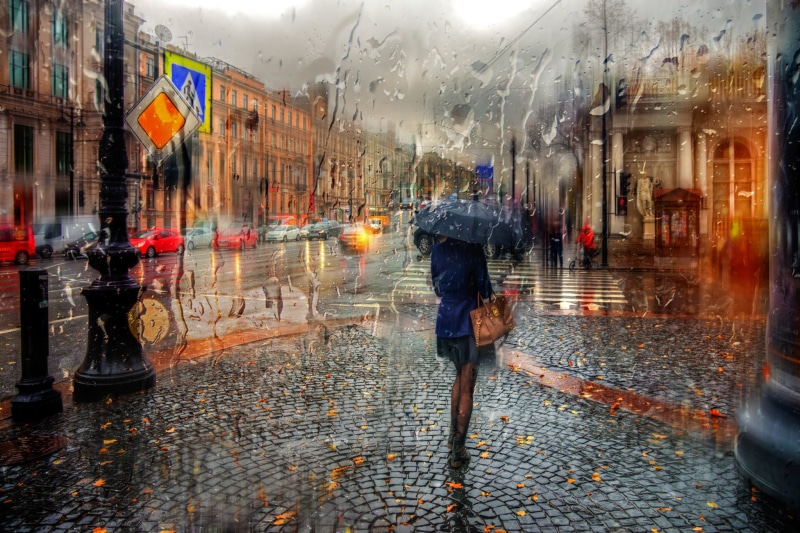real people, famous Place, street, pedestrian, traffic, building Exterior, painting, travel, cityscape, autumn, one person, urban Scene, wet, holding, transportation