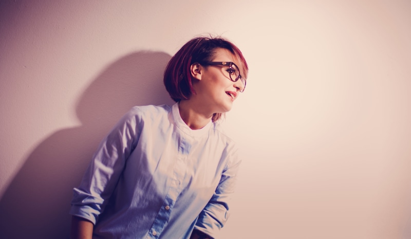 front view, caucasian Ethnicity, eyeglasses, adults only, casual Clothing, people, woman, men, beautiful woman, hair, waist up, wall - building feature