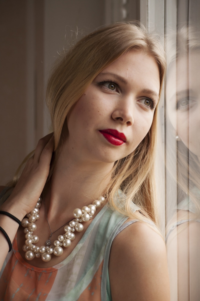 not retouched, leaning, natural, necklace, tank, portrait, window, relaxed, unretouched, beautiful, top, one person, long, full, calm, wall, beautiful woman