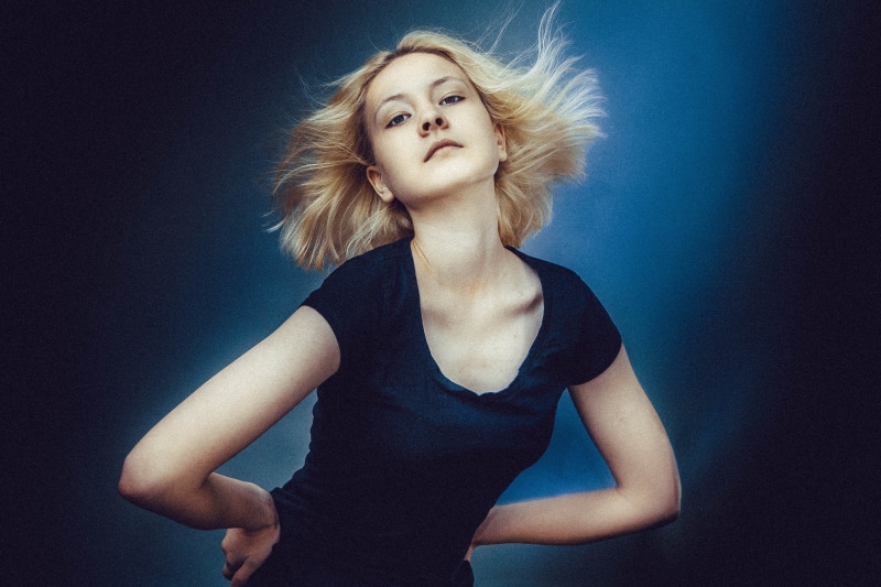 head, beautiful people, woman, girl, scoop-neck, human hair, indoors, shadow, waist up, face, shirt, person, thin, blue, figure, teenager, blond, adult