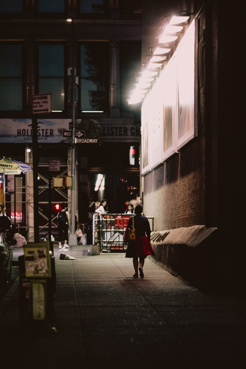 person, from behind, rear view, illuminated, built structure, the way forward, red, street light, walking away, walking, lifestyles, building exterior