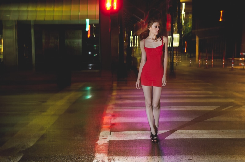 walking, hairstyle, shoe, 4K, young adult, dallas, night, female, transportation, front view, illuminated, built structure, red, casual clothing, road