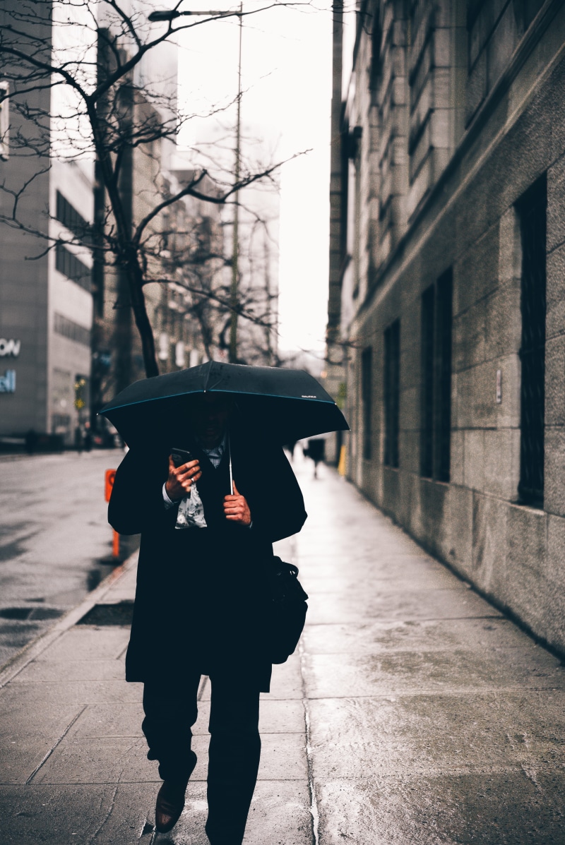 wet, 4K, one Person, man, office building exterior, headless, daytime, urban Scene, day, built structure, protection, lifestyles, rain, building exterior