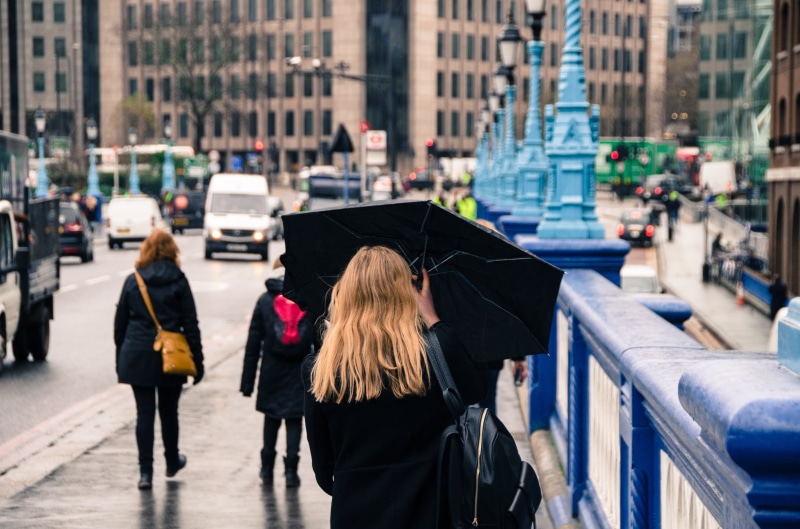 city Life, wet, female, england, protection, real people, rain, women, walking, 4K, hair, transportation, outdoors, urban Scene, umbrella, rear view, building exterior