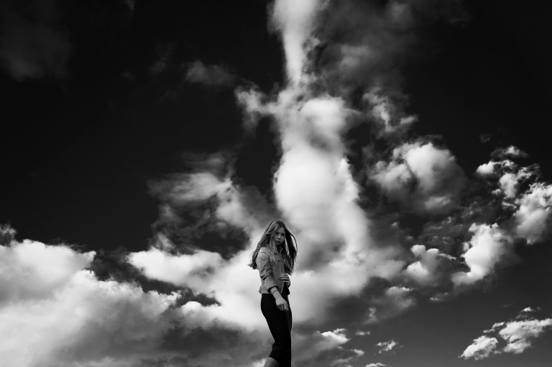 lady, beauty in nature, nature, day, life style, city, dramatic Sky, sky, riddle, one person, hair, low angle view, rear view, tranquility, adult, photography