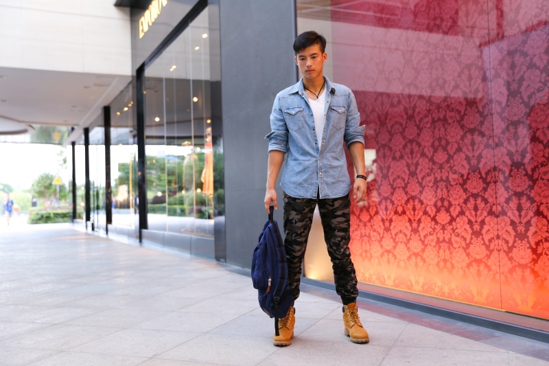 adult, men, leisure activity, tan, people, city, full length, jeans, pants, the shop window, standing, blue, manhunt, day, lifestyles, long, shirt, male