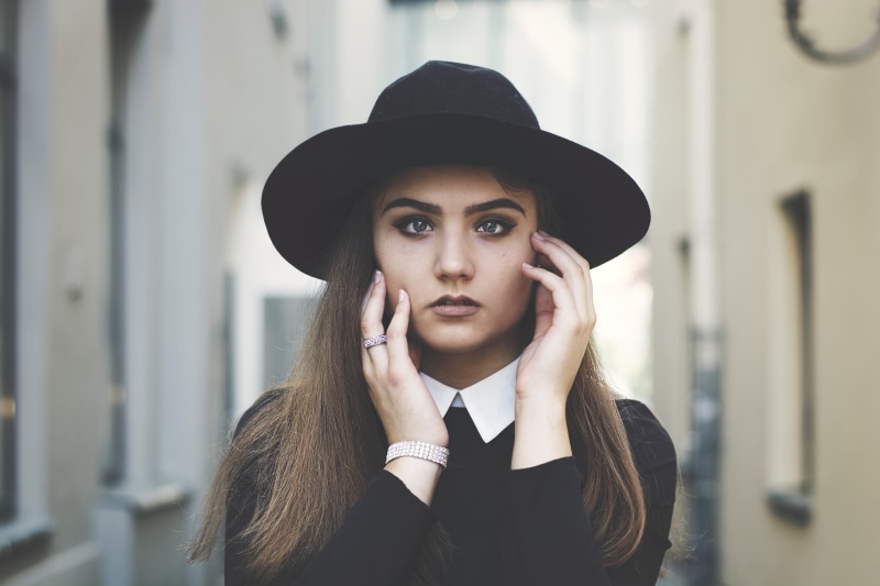 only women, clothing, elegance, people, 5K, beautiful woman, portrait, adult, talking, hat, long, shirt, front view, one young woman only, hairstyle, female