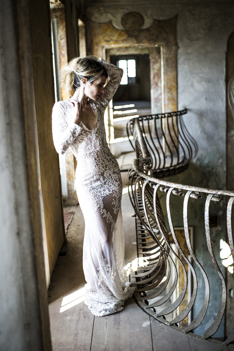 metal, one woman only, concrete, real people, adults only, young Adult, females, beside, beauty, fashion, front, one Person, young women, built structure