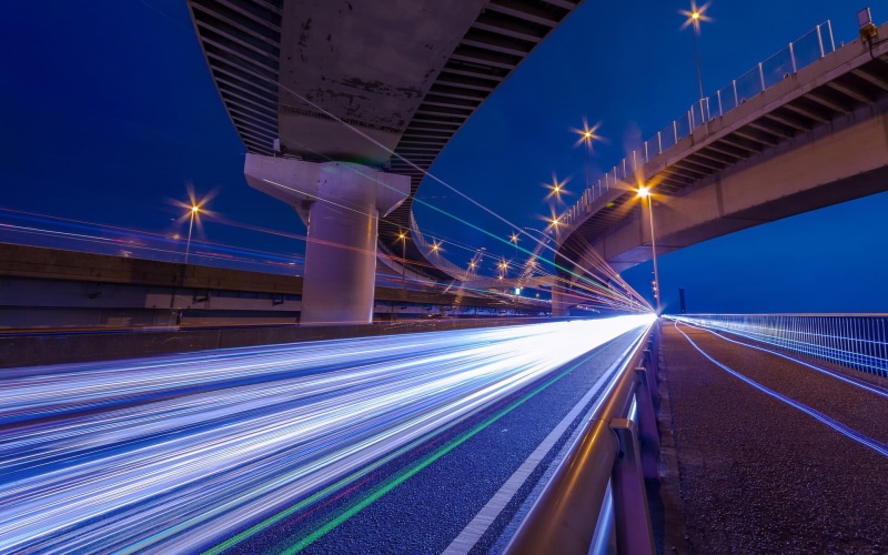 no people, diminishing perspective, street light, direction, bridge, light, road, light trail, glowing, interchange, speed, street, timelapse, lighting equipment