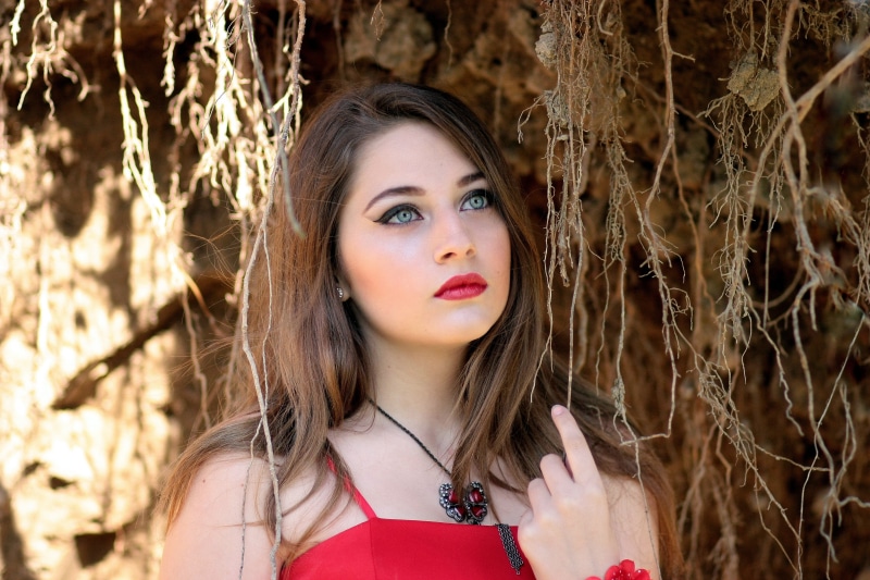 real people, wearing, females, beauty, outdoors, strap, long hair, hair, beautiful woman, headshot, seductive, contemplation, young Adult, women, woman
