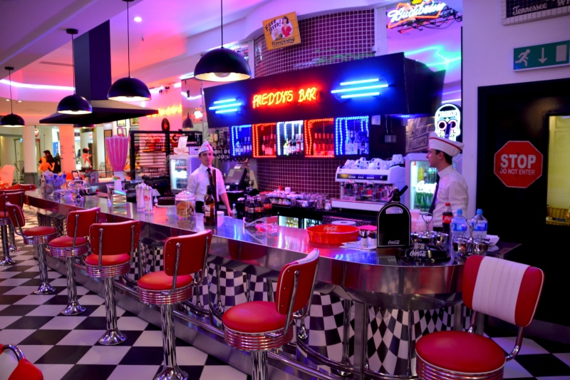 bar, modern, style, bar - drink establishment, setting, table, business, service, glass, red chairs, work, restaurant, food, food and drink, drink, nobody