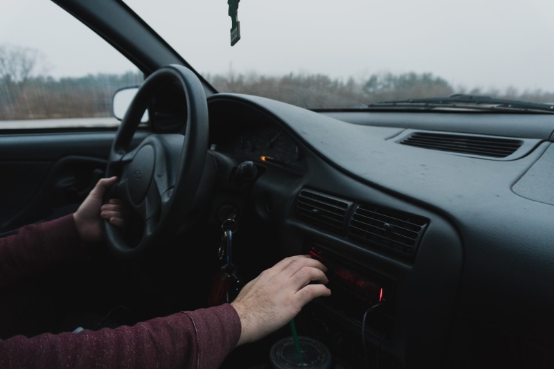 car interior, wearing, drive, hand, inside, steering Wheel, daytime, speed, motor vehicle, maroon, glass - material, mode of transportation, land Vehicle