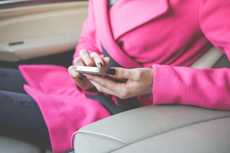 text Messaging, mode of transportation, sitting, phone, mobile Phone, hand, pink color, passenger, people Traveling, messaging, mobile, transportation