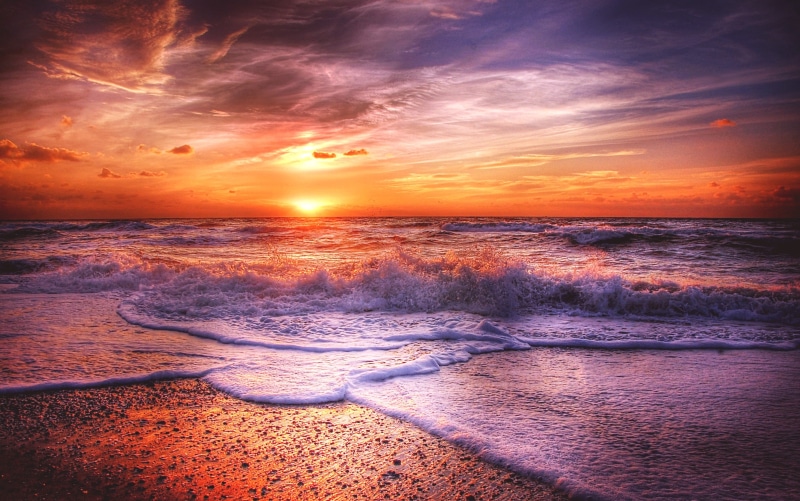 sunrise - Dawn, aquatic sport, blue sky, cloud - Sky, dusk, coastline, sky, atmospheric, time, wind, land, summer, beauty In Nature, seascape, color Image