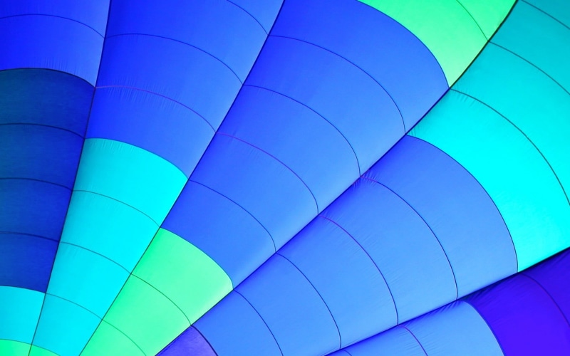 blue, full frame, close-up, balloon, flying, multi colored, transportation, air, day, 1080P, outdoors, pattern, no people, ballooning festival, adventure
