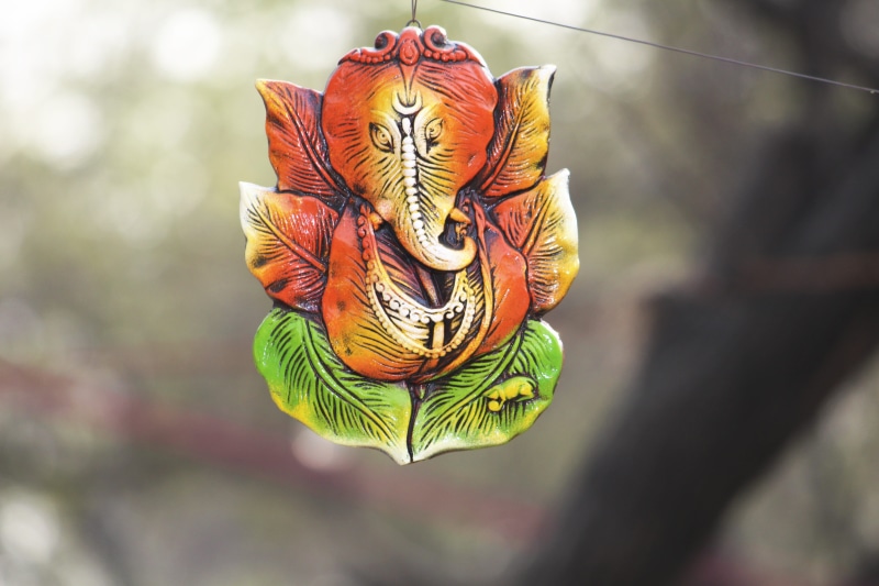 animal representation, photography, sculpture, day, craft, outdoors, multi colored, beauty in nature, chaturthi, pattern, close-up, ganapati, creativity