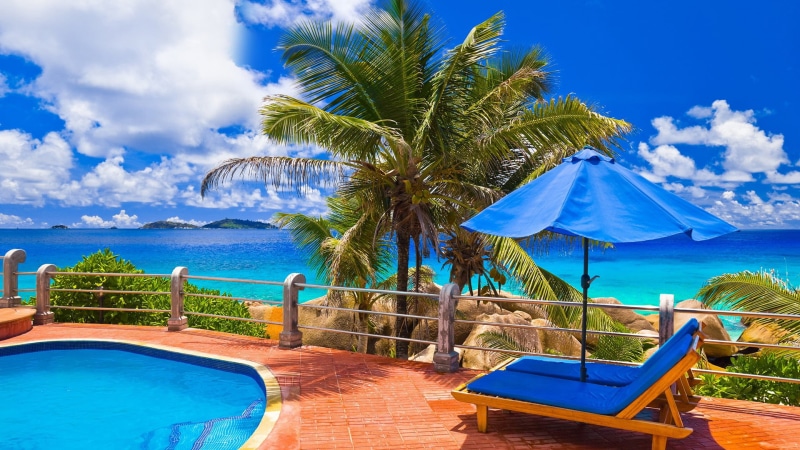 palm tree, paradise, summer, swimming pool, caribbean, beach, relaxation, lounge chair, bay, sun, no people, holiday, resort, scenic, sea, landscape, land