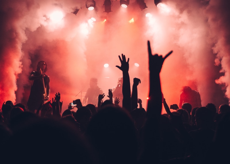 music festival, large group of people, stage, illuminated, live performance, live show, arms raised, concert, real people, live, musician, party, celebration