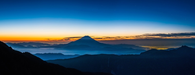 no people, travel destinations, covered, japan, sky, panoramic landscape, mountain Peak, mt fuji, dawn, at the foot of the town the lights of the, silence