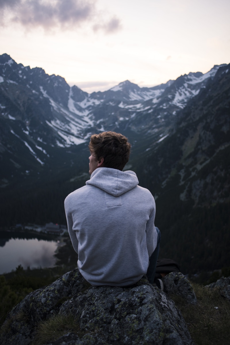 rock, tranquility, person, rock - object, 5K, mountain, photo, non-urban scene, leisure activity, mountain range, sitting, lifestyles, man, rear view