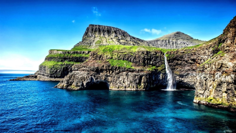 waterfall, rock, islet, blue ocean, ocean, blue sea, cape, water, day, rock formation, sea, beauty in nature, mount scenery, idyllic, faroe islands, tranquility