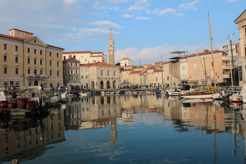 horizon, church, no people, building, mode of transportation, day, landscape, sky, canal, residential district, seaside, waterfront, architecture, reflection