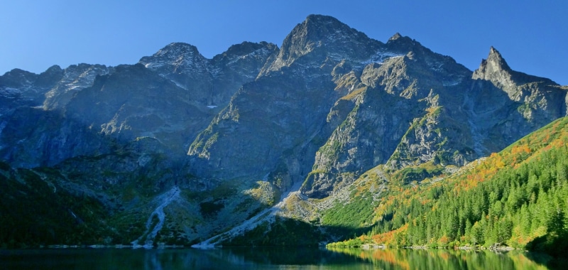 water, the high tatras, pine tree, sky, pine woodland, the beauty of the mountains, outdoors, rock - object, nature, plant, mountains, environment, beauty in nature