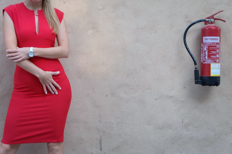 standing, young women, model, young adult, fire, adult, extinguisher, women, lifestyles, dress, female, woman, clothing, tight, midsection, holding, fashion