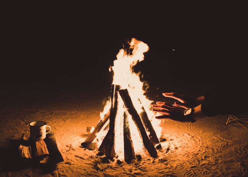 nature, light, melting, heat - temperature, bonfire, warning sign, one man only, burning, burnt, sand, outdoors, flame, one person, adult, watch, nighttime