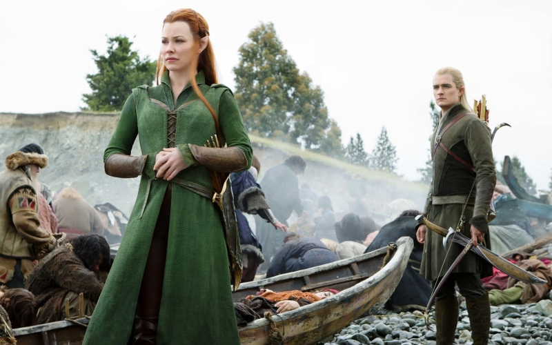 outdoors, standing, women, beautiful woman, The Hobbit: The Battle of the Five Armies, sitting, real people, redhead, day, young adult, lifestyles, clothing