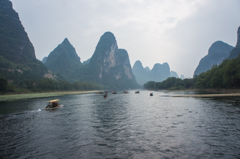 water, rock - object, beauty in nature, scenics, scenics - nature, rock, transportation, asia, solid, journey, tranquility, mountain, guangxi Zhuang Autonomous Region - China