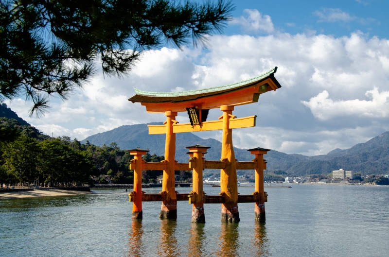 heritage, torii, shinto, water, cloud - sky, landmark, traditional, outdoors, lake, miyajima, day, itsukushima shrine, culture, famous, built structure