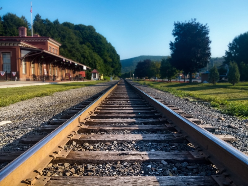 depth of field, tree, stone - object, photography, plant, surface level, trees, rock, the way forward, railroad track, nature, track, transportation, steam locomotive